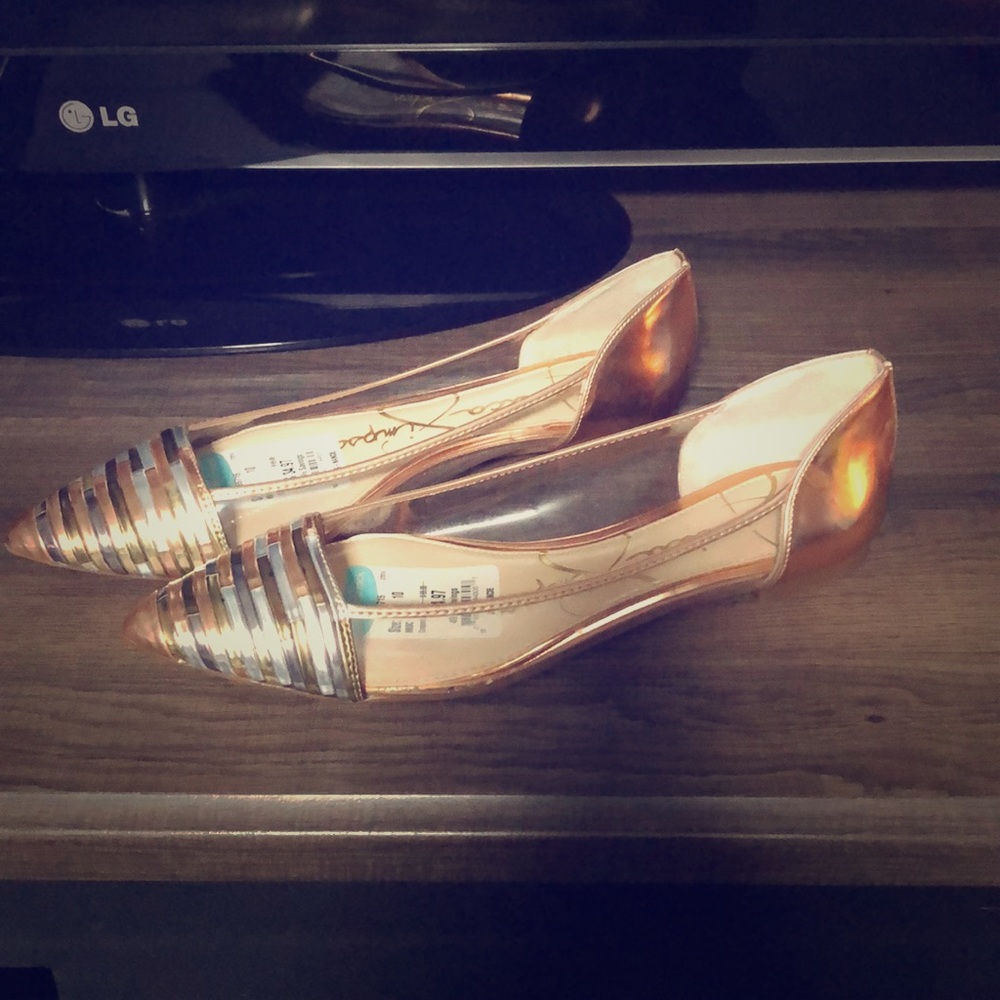Jessica Simpson Rose gold flats.  Never worn.